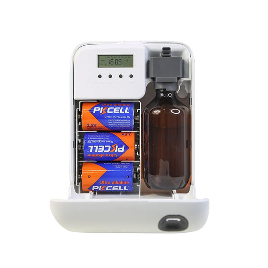 Geöffneter Diffusor mit sichtbarem LCD-Display und eingelegter Duftflasche für einfache Bedienung.